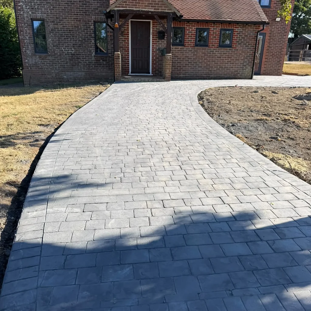 grey-stamped-concrete-path-oak-porch-house